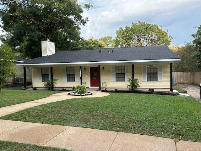 ranch-style home with a porch and a front lawn