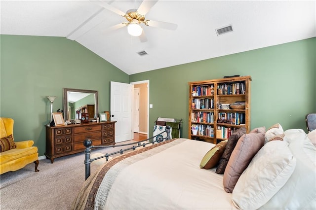 carpeted bedroom featuring lofted ceiling and ceiling fan