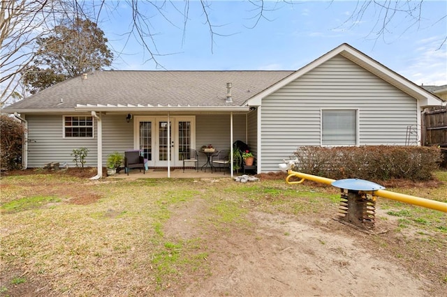 back of property featuring a patio area and french doors