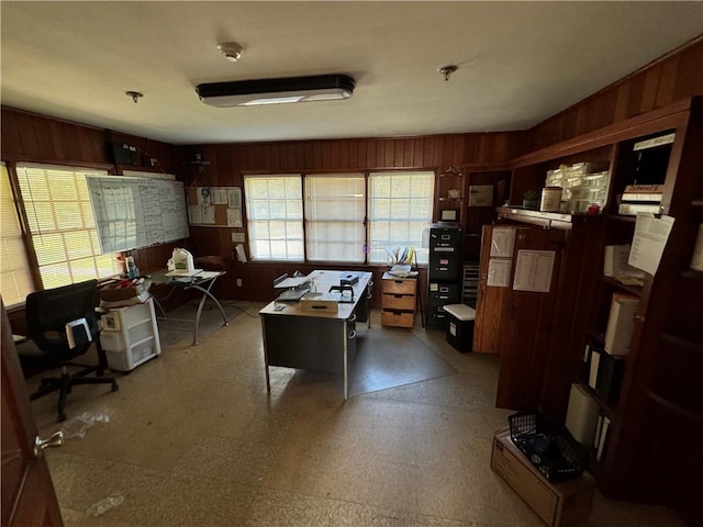 home office featuring tile patterned floors and wooden walls