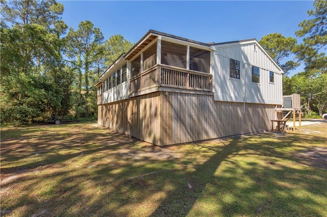 back of property with a yard