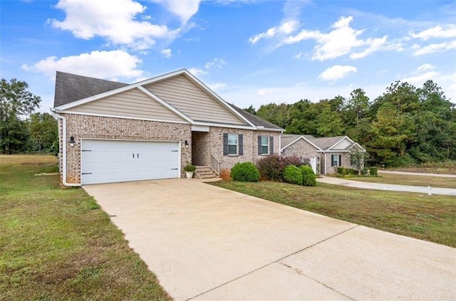 1951 Stonepine Dr, Semmes, AL 36575 - view of front of house with driveway, a front lawn, an attached garage, and brick siding
