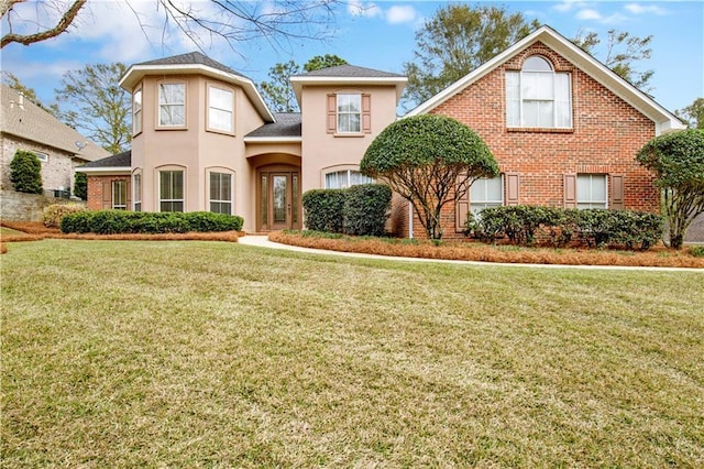 view of front of home with a front yard