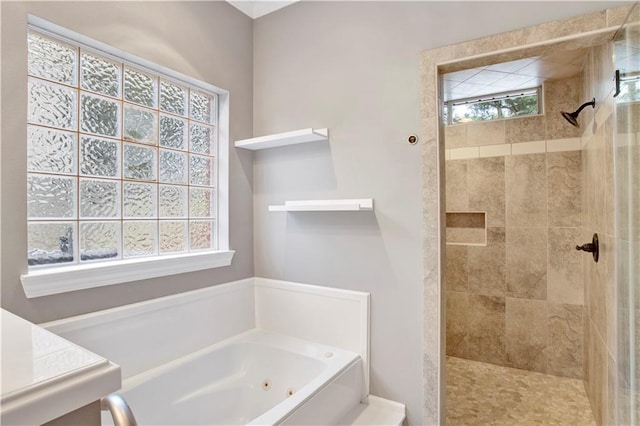 bathroom with plenty of natural light and plus walk in shower