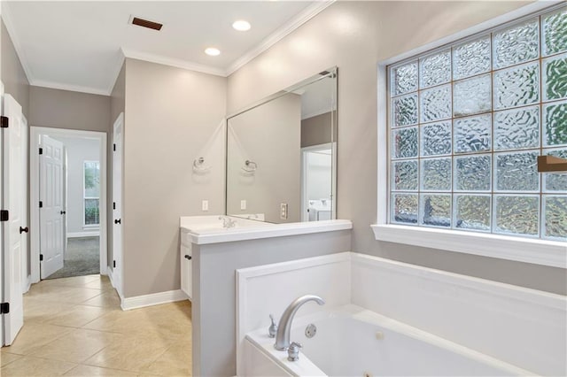 bathroom featuring tile patterned flooring, vanity, ornamental molding, and a tub to relax in