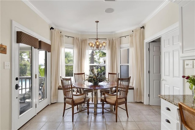 30077 River Rd, Orange Beach, AL 36561 - dining space featuring a chandelier, crown molding, and light tile patterned floors