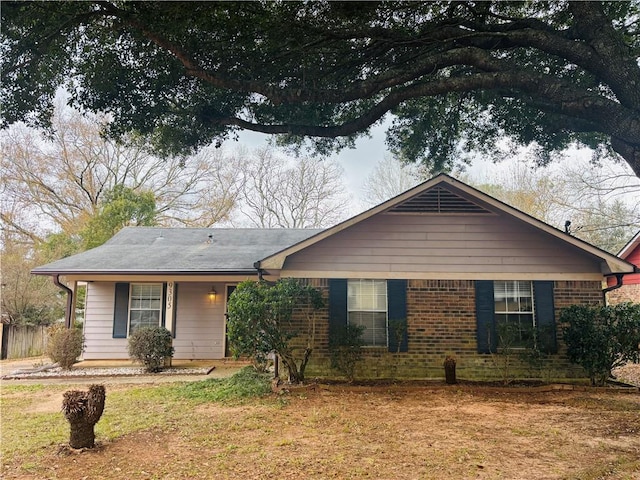 ranch-style house with a front yard