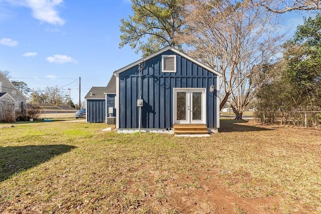 view of outbuilding with a yard