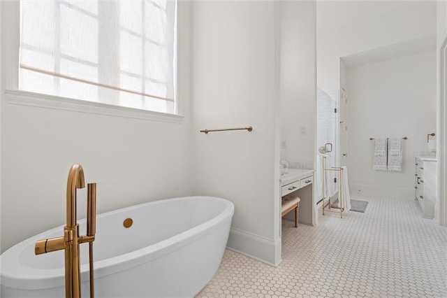 bathroom with vanity and separate shower and tub