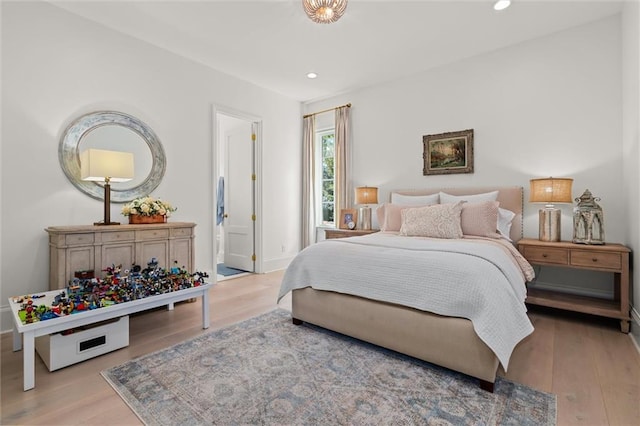 bedroom featuring light hardwood / wood-style floors