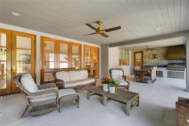 interior space with beamed ceiling, wood ceiling, ceiling fan, and french doors