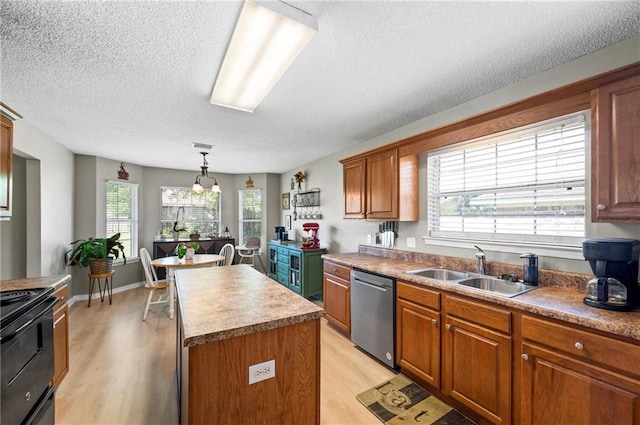 kitchen with a wealth of natural light, black range with electric cooktop, stainless steel dishwasher, and a kitchen island