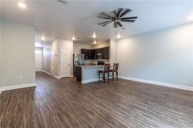 6771 Spaniel Dr Unit 3A, Spanish Fort, AL 36527 - kitchen with stainless steel appliances, open floor plan, a ceiling fan, dark wood finished floors, and recessed lighting