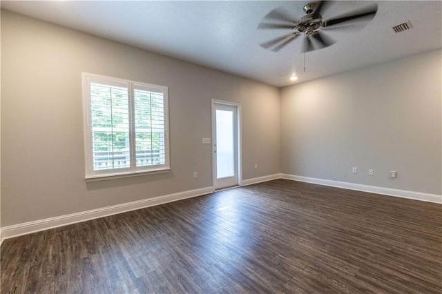 6771 Spaniel Dr Unit 3A, Spanish Fort, AL 36527 - spare room featuring ceiling fan and dark wood-style floors