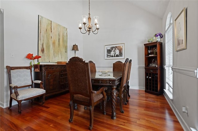 6417 Magnolia Place Ct S, Mobile, AL 36695 - dining space with baseboards, a notable chandelier, wood finished floors, and lofted ceiling