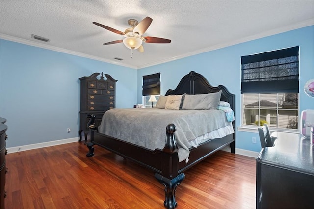 6417 Magnolia Place Ct S, Mobile, AL 36695 - bedroom featuring a ceiling fan, a textured ceiling, ornamental molding, and wood finished floors