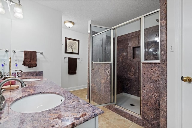 6417 Magnolia Place Ct S, Mobile, AL 36695 - full bathroom featuring double vanity, a sink, and a stall shower