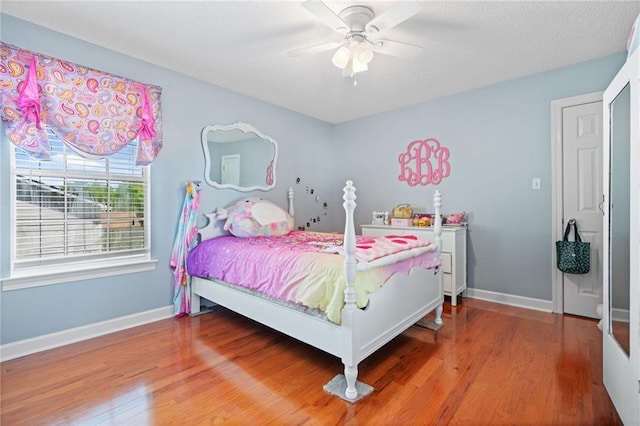 6417 Magnolia Place Ct S, Mobile, AL 36695 - bedroom featuring baseboards, ceiling fan, and wood finished floors