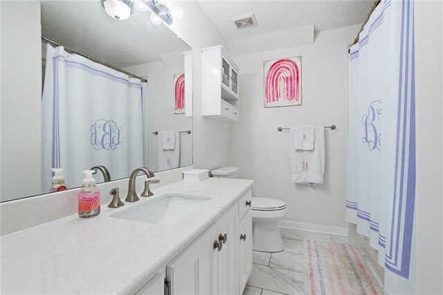 6417 Magnolia Place Ct S, Mobile, AL 36695 - bathroom with vanity, visible vents, marble finish floor, toilet, and baseboards