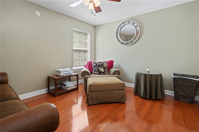 6417 Magnolia Place Ct S, Mobile, AL 36695 - living area with baseboards, a textured ceiling, ceiling fan, and wood finished floors