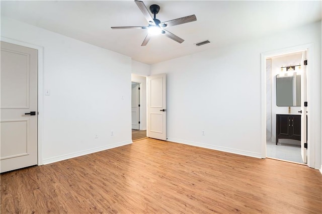 5108 Highcrest Dr, Mobile, AL 36693 - unfurnished bedroom featuring light wood-style flooring, connected bathroom, and ceiling fan