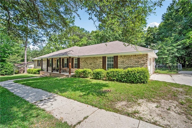 5108 Highcrest Dr, Mobile, AL 36693 - ranch-style home featuring driveway, a front yard, covered porch, an attached garage, and brick siding