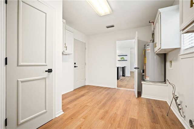 5108 Highcrest Dr, Mobile, AL 36693 - unfurnished room featuring water heater and light wood finished floors