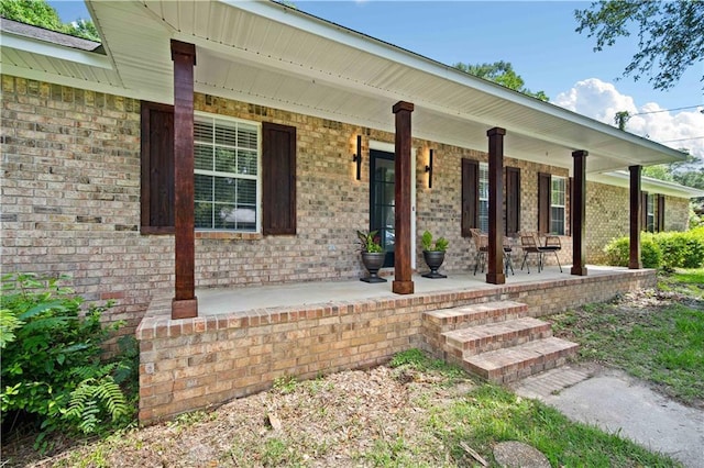 5108 Highcrest Dr, Mobile, AL 36693 - property entrance with covered porch and brick siding