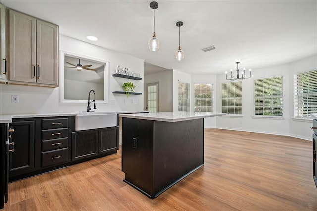 5108 Highcrest Dr, Mobile, AL 36693 - kitchen featuring light countertops, light wood finished floors, a chandelier, ceiling fan, and recessed lighting