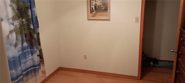 hallway featuring light hardwood / wood-style flooring