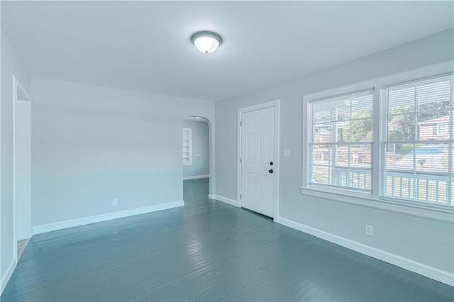 empty room featuring dark hardwood / wood-style floors