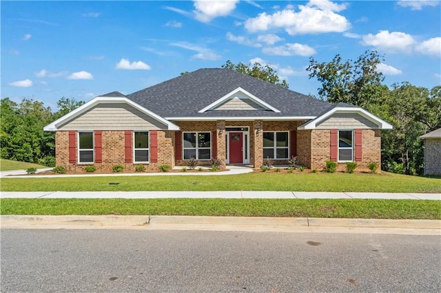 craftsman-style home with a front lawn