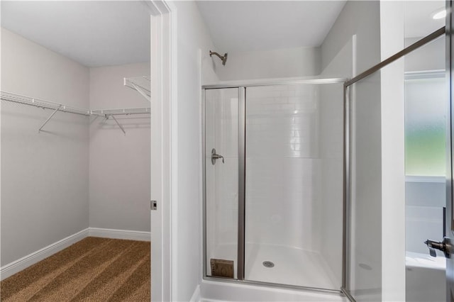 bathroom featuring walk in shower