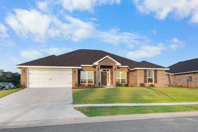 single story home with a garage and a front lawn