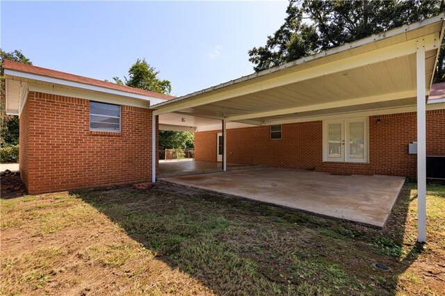 rear view of house with a carport