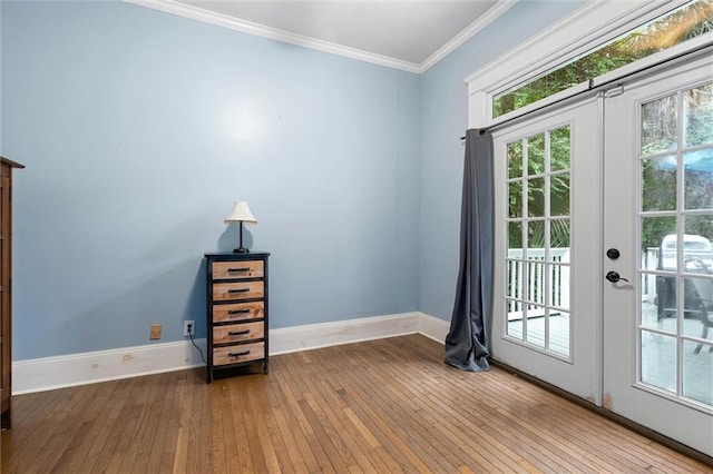 13 Demouy Ave, Mobile, AL 36606 - doorway to outside featuring hardwood / wood-style floors, baseboards, and ornamental molding