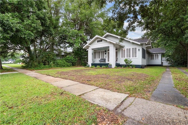 13 Demouy Ave, Mobile, AL 36606 - bungalow-style home with a porch and a front yard