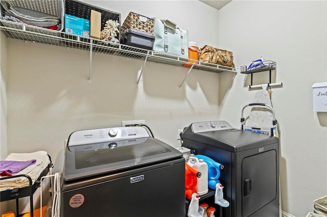 laundry area featuring independent washer and dryer