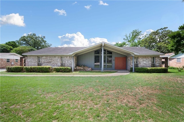504 Vaughan Dr N, Satsuma, AL 36572 - mid-century inspired home with a front lawn