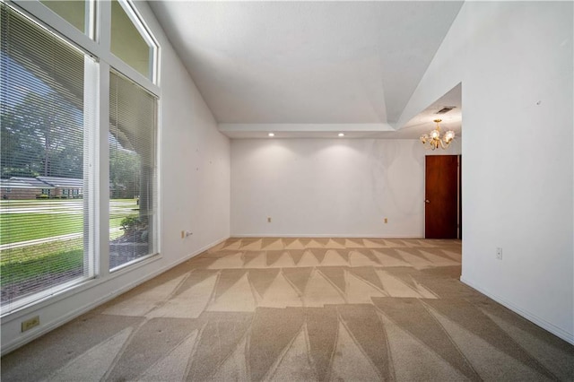 504 Vaughan Dr N, Satsuma, AL 36572 - empty room with a chandelier, light carpet, baseboards, and recessed lighting