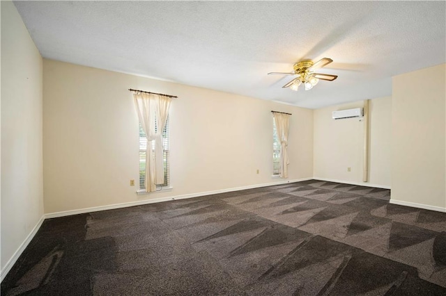 504 Vaughan Dr N, Satsuma, AL 36572 - unfurnished room with an AC wall unit, a ceiling fan, dark colored carpet, and baseboards