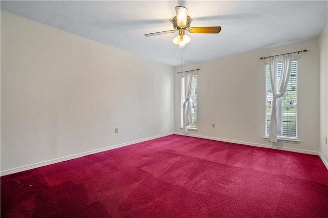 504 Vaughan Dr N, Satsuma, AL 36572 - carpeted spare room featuring a ceiling fan, baseboards, and a textured ceiling