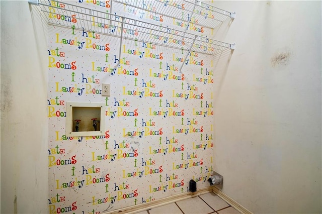 504 Vaughan Dr N, Satsuma, AL 36572 - bathroom with tile patterned flooring and baseboards