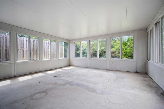 504 Vaughan Dr N, Satsuma, AL 36572 - unfurnished sunroom with concrete flooring
