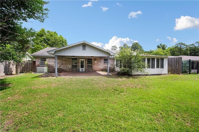504 Vaughan Dr N, Satsuma, AL 36572 - rear view of property featuring a patio and brick siding