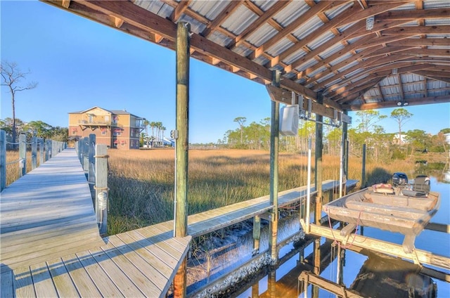 dock area with a water view