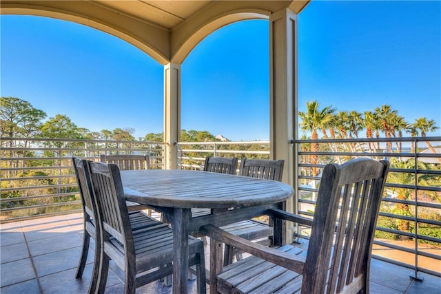 view of patio featuring a balcony