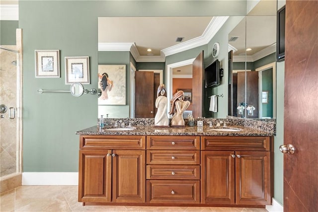 bathroom featuring crown molding, tile patterned flooring, vanity, and a shower with shower door