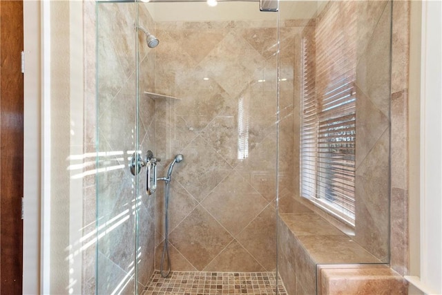 bathroom featuring an enclosed shower