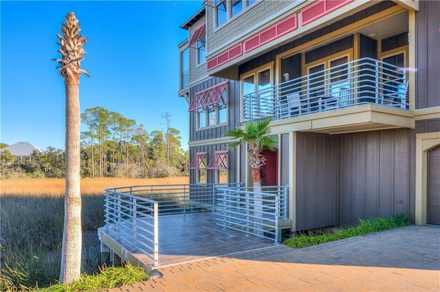 view of dock featuring a balcony